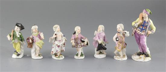 A Meissen figure of a baker and six Meissen Cupid in Disguise figures, all c.1750-70, 13.5cm and approx. 9cm (faults)